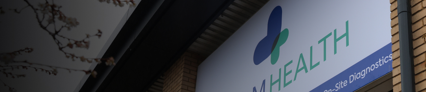 Medical imaging professional reviewing scans